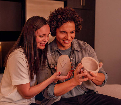 Couple in a pottery kit date night