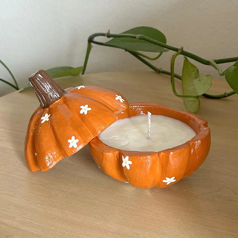 Halloween-themed floral pumpkin candle with Sculpd Candle Making Kit